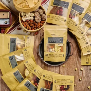 Assorted traditional Chinese herbal formula packs by Wong Shook Phing, featuring dried herbs for wellness soups and TCM remedies.